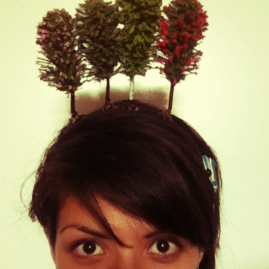 A girl with a forest growing out of her head...